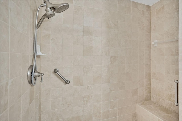 bathroom featuring tiled shower