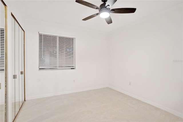 unfurnished bedroom featuring ceiling fan and ornamental molding