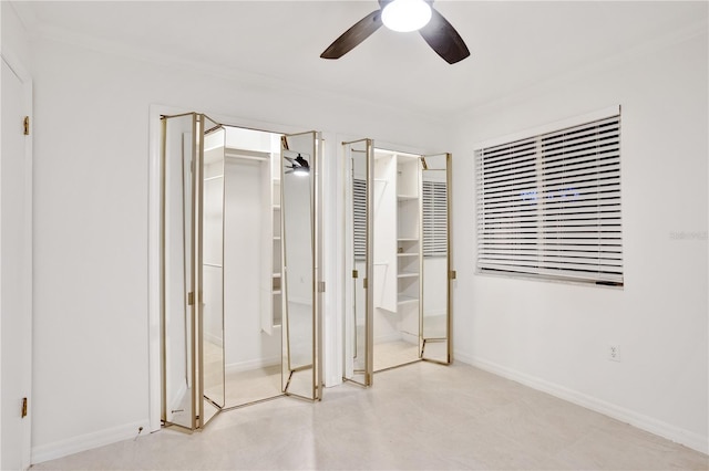 unfurnished bedroom featuring ceiling fan