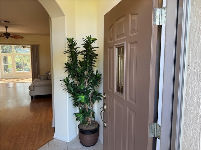 interior space featuring light hardwood / wood-style floors and ceiling fan