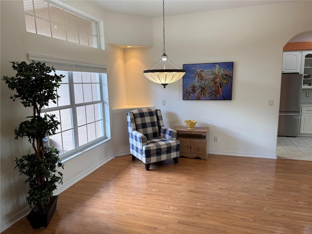 sitting room with light hardwood / wood-style flooring