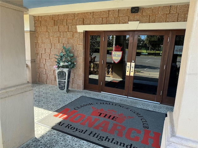 entrance to property featuring french doors