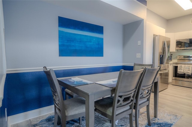 dining area featuring light hardwood / wood-style floors