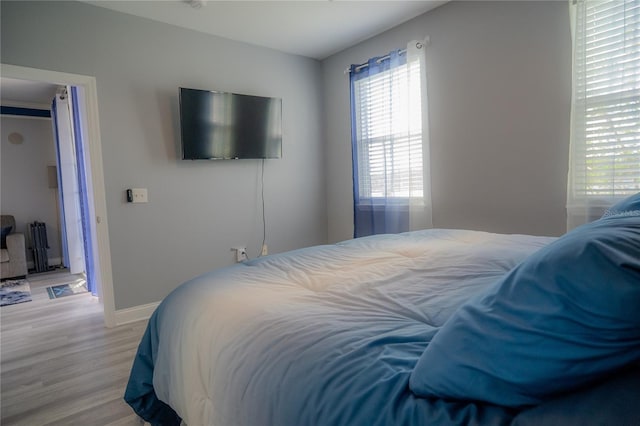 bedroom featuring light hardwood / wood-style floors