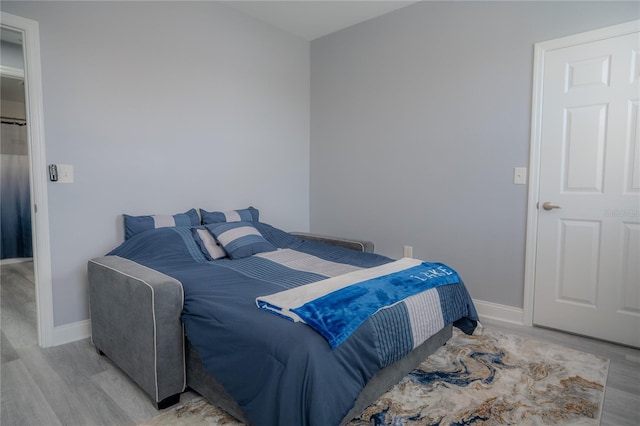 bedroom featuring light hardwood / wood-style flooring