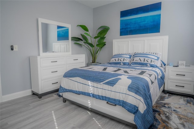 bedroom with light wood-type flooring