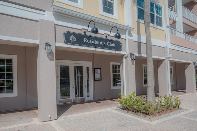 3406 Soho St Unit 102, Orlando, FL 32835 - entrance to property featuring french doors and stucco siding