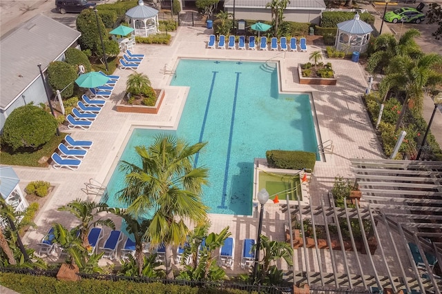 3406 Soho St Unit 102, Orlando, FL 32835 - bird's eye view of a pool area