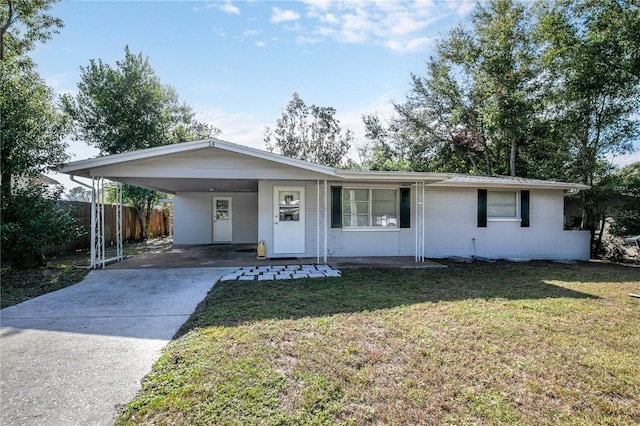 single story home with a carport and a front yard