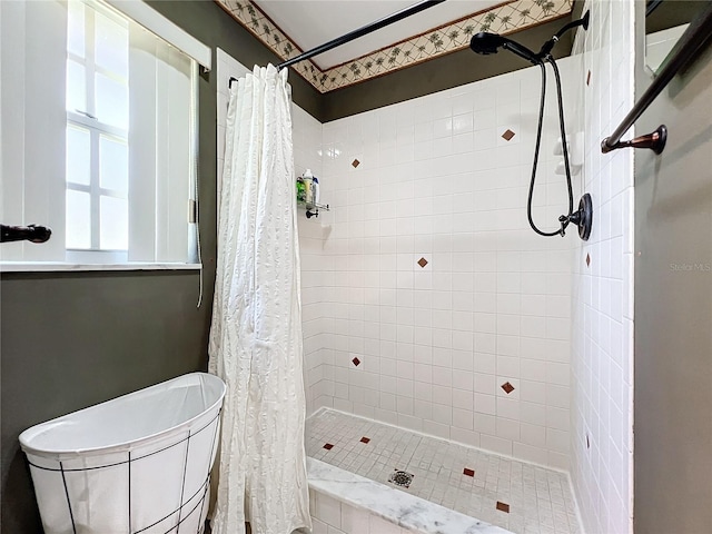 bathroom with curtained shower