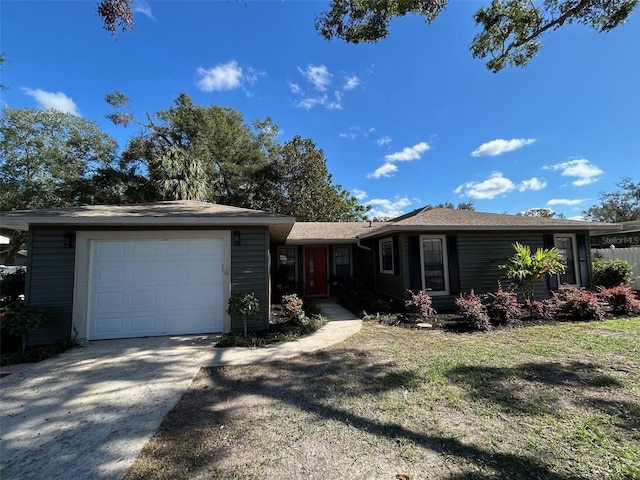 single story home featuring a garage