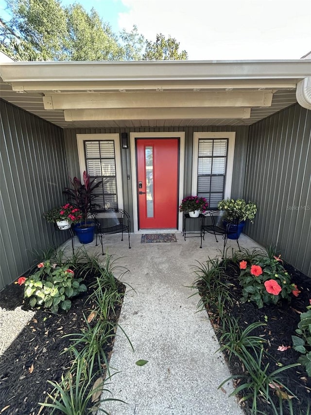 entrance to property with covered porch