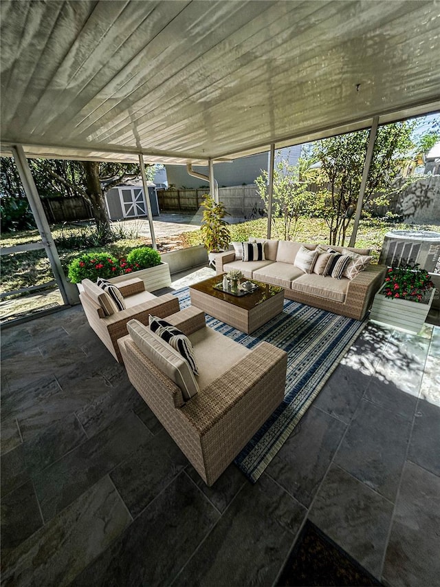sunroom / solarium featuring an outdoor hangout area