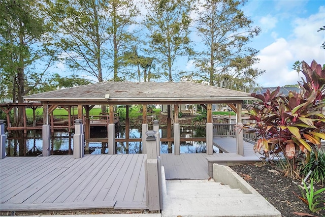 dock area with a water view