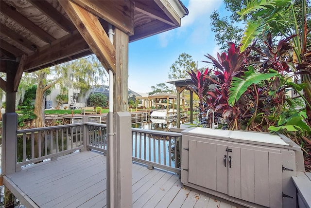 wooden deck with a water view