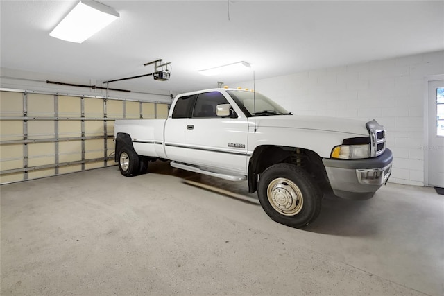 garage featuring a garage door opener