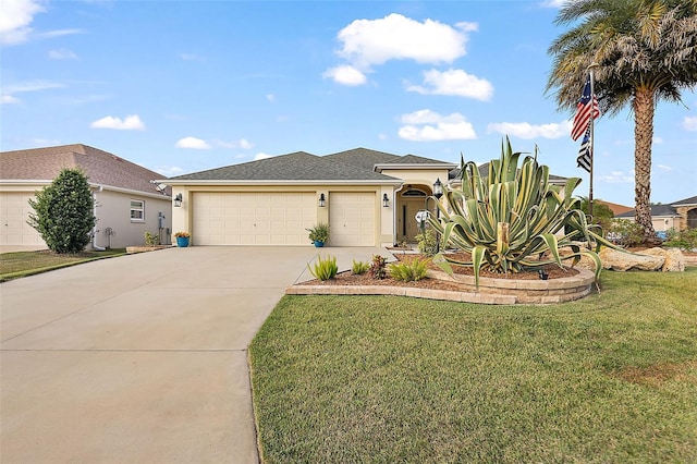 view of front facade featuring a garage and a front lawn