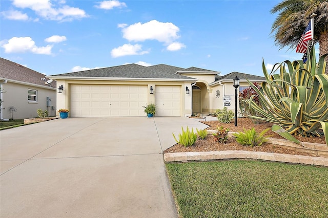 view of front of home featuring a front lawn and a garage