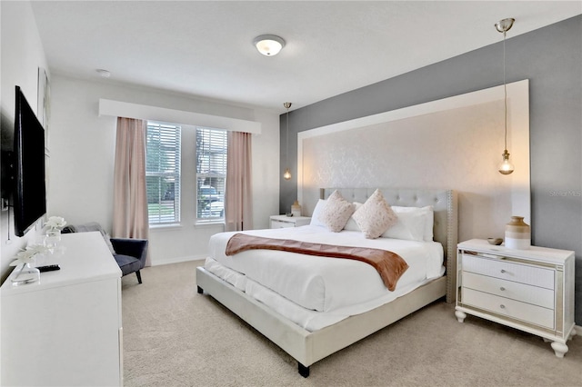 bedroom with light colored carpet