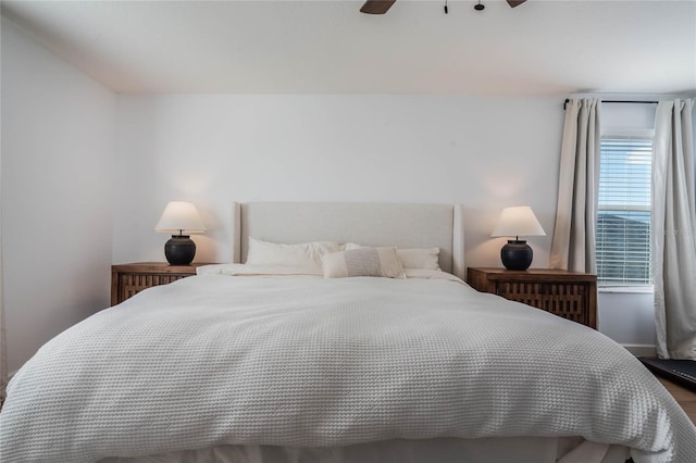 bedroom featuring ceiling fan and hardwood / wood-style floors