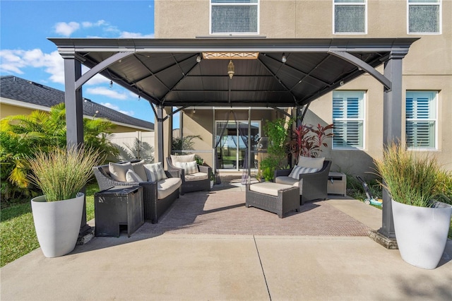 view of patio / terrace with a gazebo and outdoor lounge area