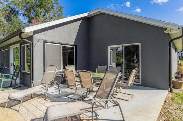 back of house with a patio area