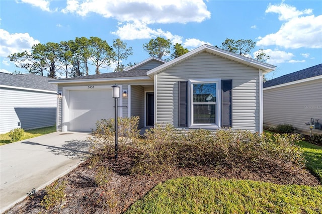 single story home featuring a garage