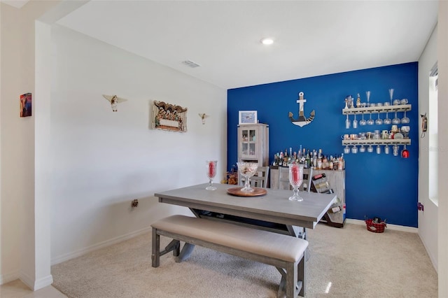 dining room featuring carpet