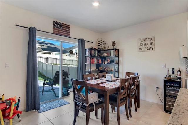 tiled dining room with beverage cooler