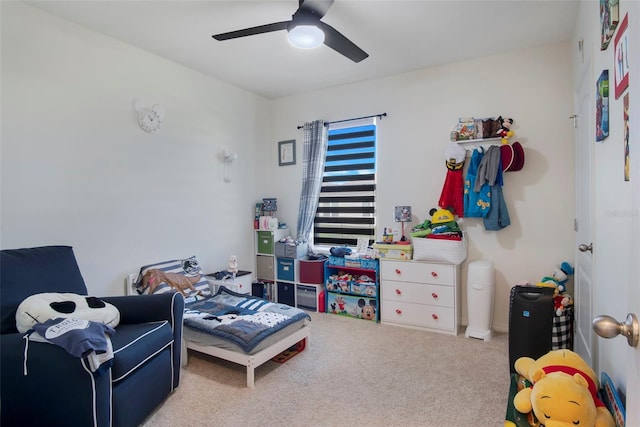 interior space with ceiling fan and light carpet