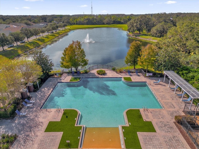 view of pool featuring a water view