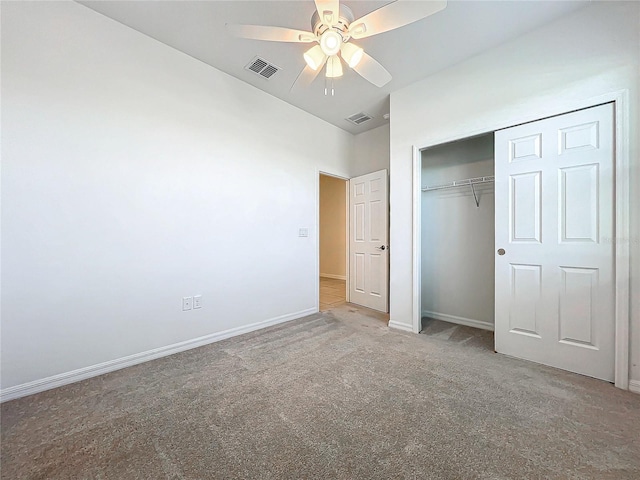 unfurnished bedroom with carpet flooring, a closet, and ceiling fan