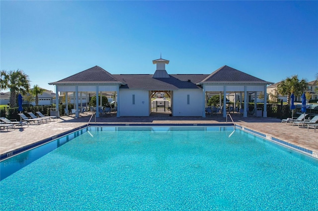 view of pool featuring a patio