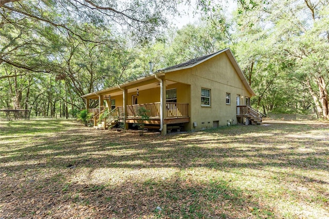 view of home's exterior featuring a lawn