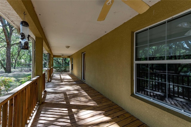 balcony featuring ceiling fan