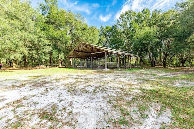 view of community featuring an outbuilding