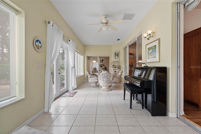 sitting room with ceiling fan and light hardwood / wood-style floors