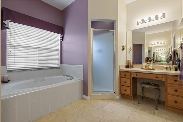 bathroom with vanity, tile patterned floors, and independent shower and bath