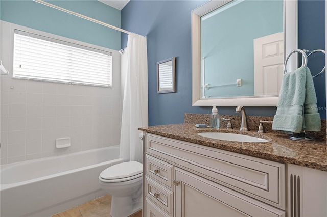 full bathroom featuring vanity, toilet, a wealth of natural light, and shower / tub combo with curtain