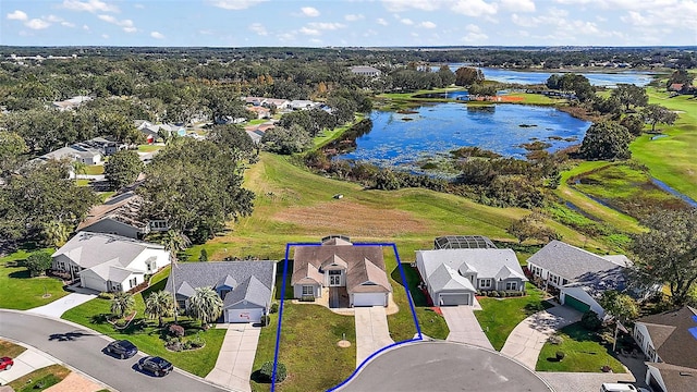 drone / aerial view with a water view