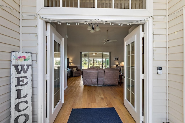 exterior space featuring ceiling fan