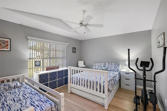 bedroom featuring ceiling fan and light hardwood / wood-style floors