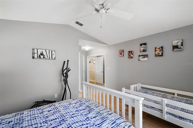 bedroom featuring wood-type flooring, ceiling fan, and lofted ceiling