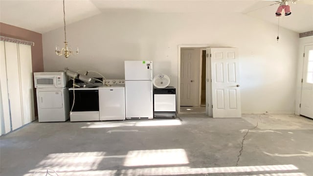 kitchen with washer and clothes dryer, lofted ceiling, white appliances, hanging light fixtures, and white cabinetry