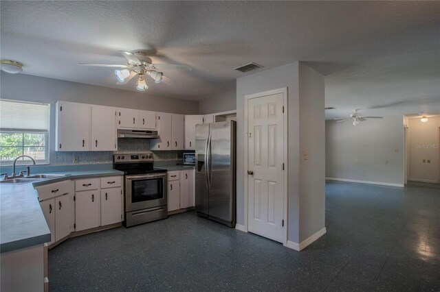 kitchen featuring ceiling fan, sink, a textured ceiling, white cabinets, and appliances with stainless steel finishes