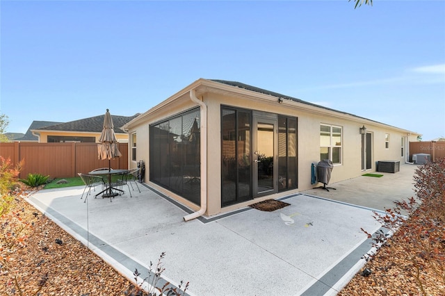 rear view of property with a patio area