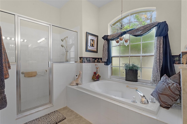 bathroom with plus walk in shower and tile patterned floors