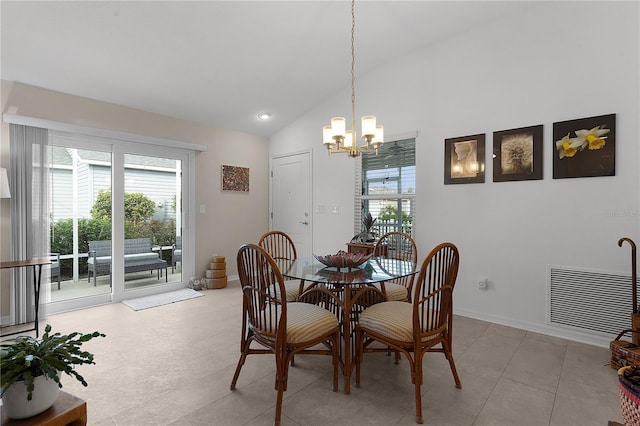 dining room featuring light tile patterned floors, vaulted ceiling, and a notable chandelier