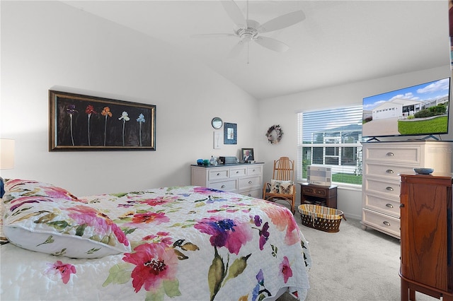 carpeted bedroom featuring ceiling fan and lofted ceiling