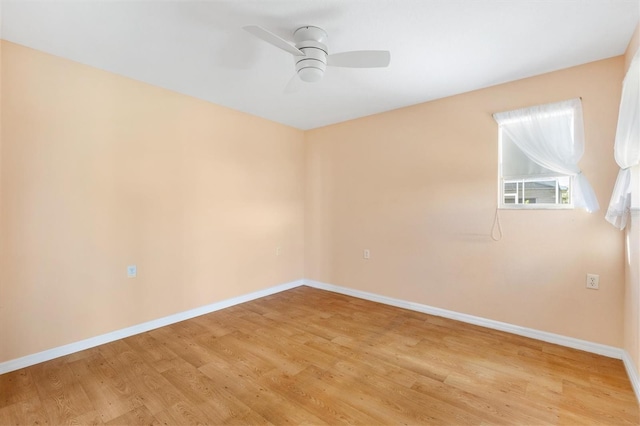 empty room with light hardwood / wood-style floors and ceiling fan